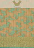 Beige And Turquoise Floral Woven Tussar Saree - Taashi