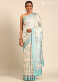 Cream And Teal Jaal Floral Printed Art Tussar Matka Silk Saree - Taashi
