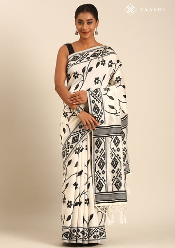 Cream And Black Floral And Tribal Pattern Woven Tussar Saree