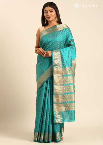 Teal Traditional Zari Butta Woven Tussar Saree