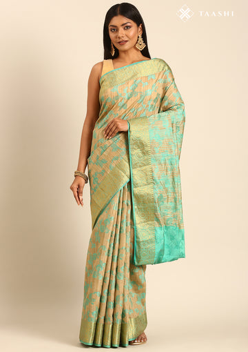 Beige And Turquoise Floral Woven Tussar Saree
