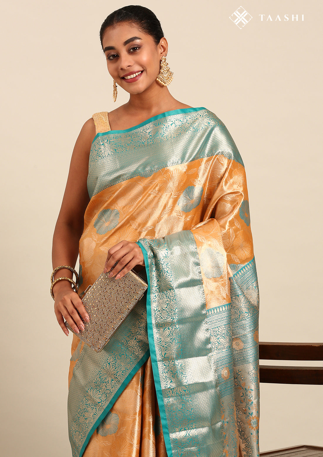 Orange and Teal Floral Pattern Tissue Brocade Kanchipuram Saree
