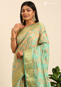 Beige And Turquoise Floral Woven Tussar Saree - Taashi