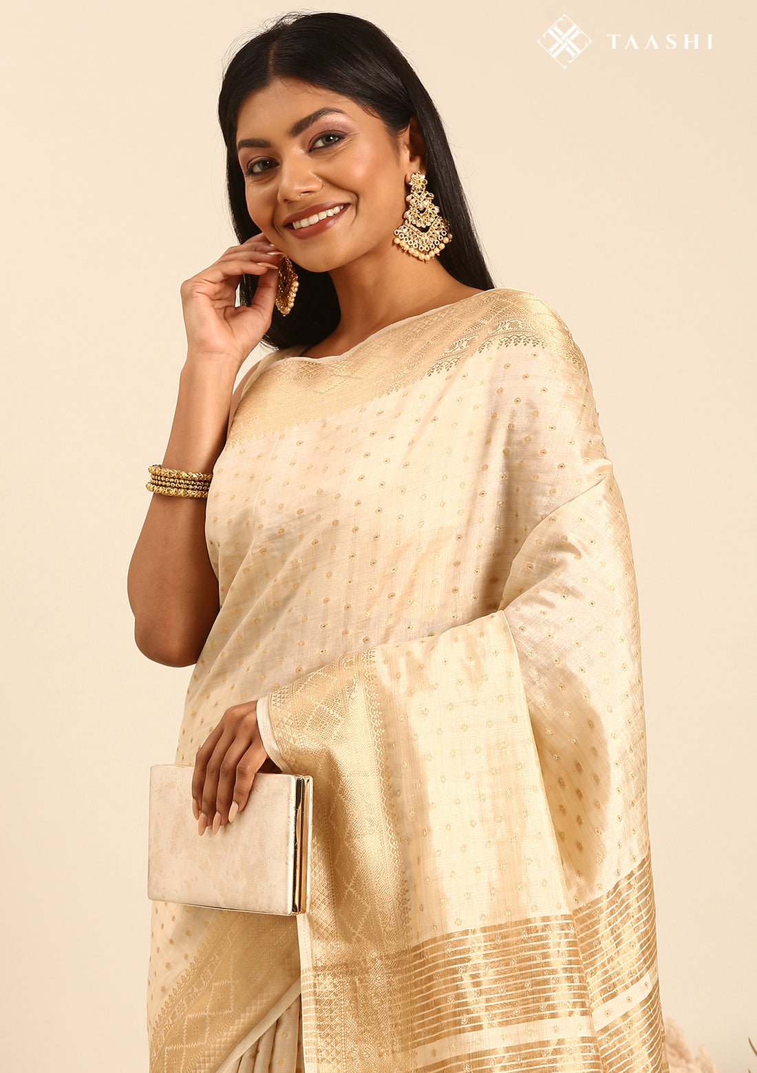 Cream Traditional Zari Butta Woven Tussar Saree