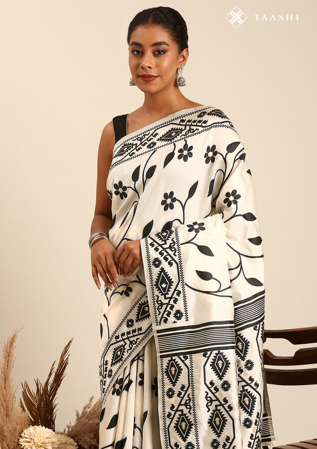 Cream And Black Floral And Tribal Pattern Woven Tussar Saree