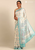 Cream And Teal Jaal Floral Printed Art Tussar Matka Silk Saree - Taashi
