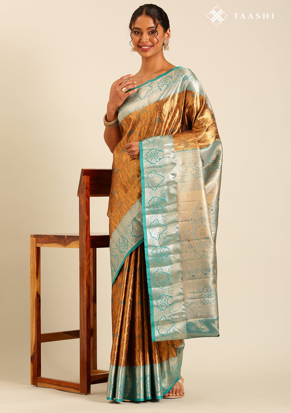 Brown And Gold Semi Kanchipuram Saree With Sea Green Border