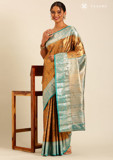 Brown And Gold Semi Kanchipuram Saree With Sea Green Border