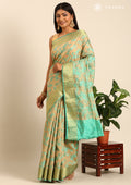 Beige And Turquoise Floral Woven Tussar Saree - Taashi