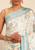 Cream And Teal Jaal Floral Printed Art Tussar Matka Silk Saree - Taashi