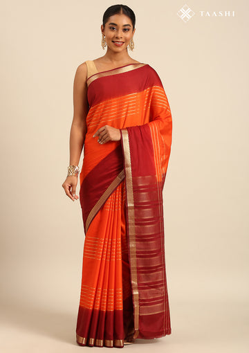 Orange And Maroon Woven Stripes 2D Dyed Crepe Saree