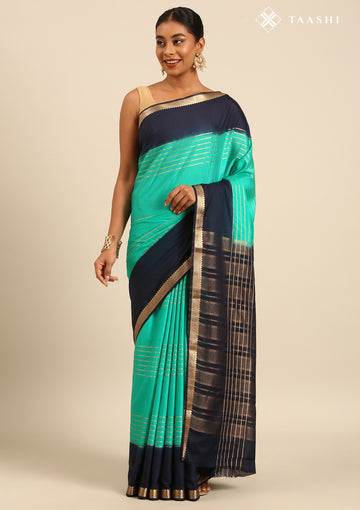 Green And Navy Blue Woven Stripes 2D Dyed Crepe Saree
