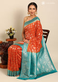 Burnt Orange Zari Woven Georgette Saree - Taashi