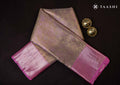 Full length front view model drape photograph of Taashi The Sage Blossom saree (PKJ26) in premium Sage Green & Antique Gold Shot Kanjeevaram fabric layout.