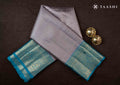 Full length front view model drape photograph of Taashi The Slate Rhythm saree (PKJ51) in premium Silver Grey & Champagne Shot Kanjeevaram fabric layout.