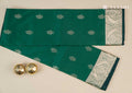 Full length front view model drape photograph of Taashi Emerald Empress saree (PKJ64) in premium Emerald Forest Green Kanjeevaram fabric layout.