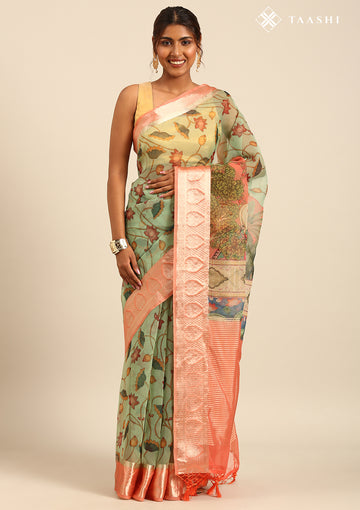 Dusty Peach And Green Nature InspiRed Printed Organza Saree