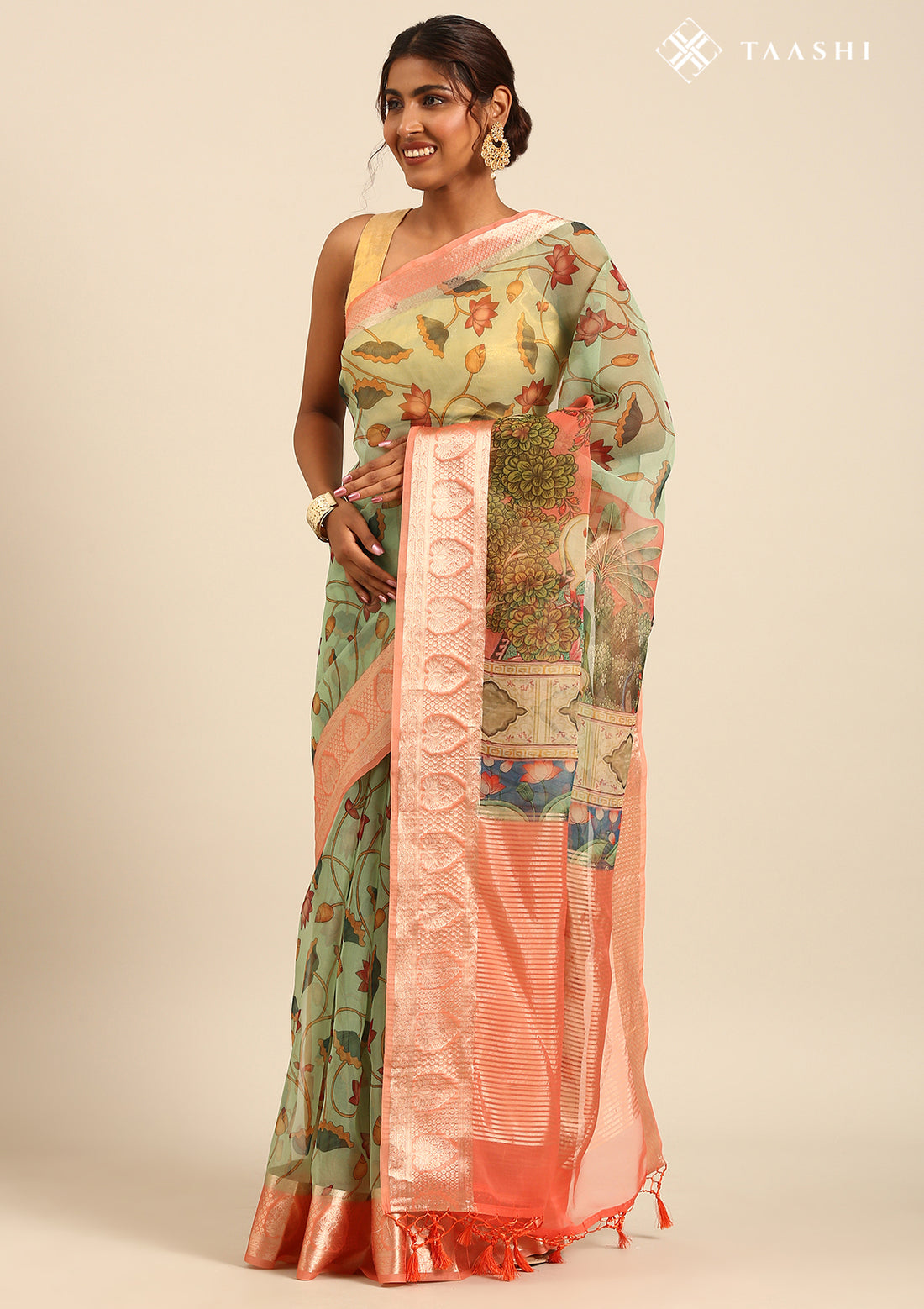 Dusty Peach And Green Nature InspiRed Printed Organza Saree