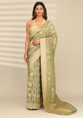 Vellum Nocturne green saree from Translucent Shadows collection by Taashi worn by model